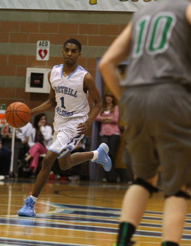 Foothill’s Jalen Shepard (1) brings the ball up the court against Green Valley on Wedn ...