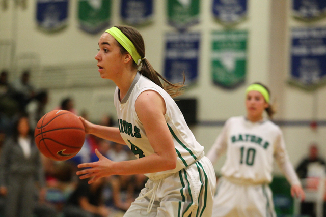 Green Valley’s Ellee Barton (4) drives against Basic during the quarterfinals of the S ...