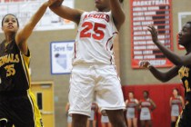 Arbor View’s Dana Lewis (25) takes a shot over Bonanza’s Alexis Harris (35) and ...