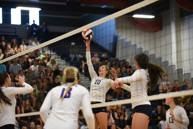 Shadow Ridge’s Stacy Hone (10) tips the ball against Bishop Gorman defenders during th ...