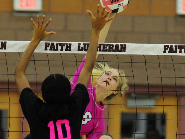 Faith Lutheran’s Bryanna Neagle (8) kills the ball against Palo Verde during their pre ...