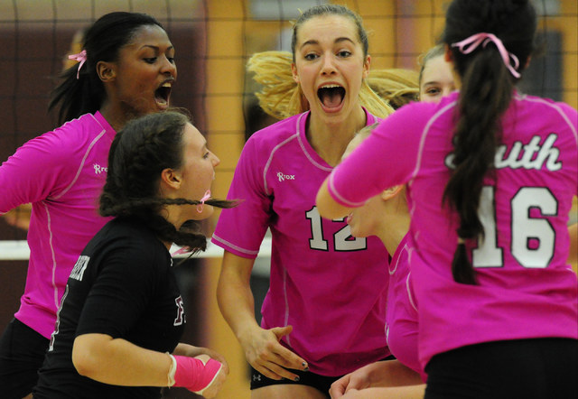 Faith Lutheran players celebrate their set win over Palo Verde during their prep volleyball ...