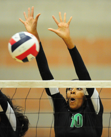 Palo Verde High School’s Jacque Fields blocks a Foothill High School spike during thei ...