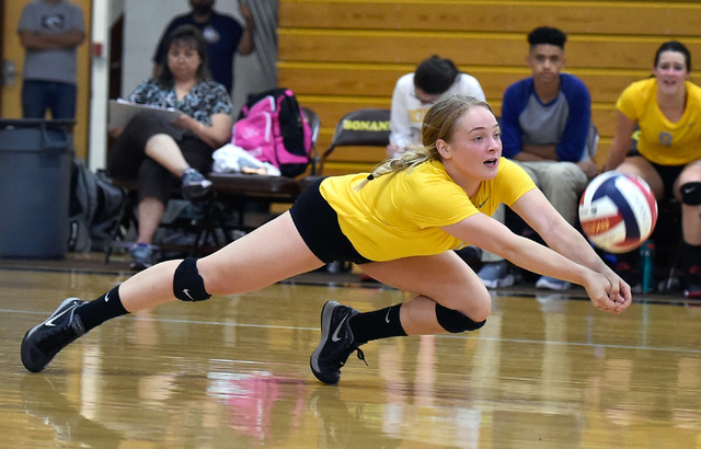 Bonanza’s Alexa Rodriguez dives for the ball during a high school volleyball game agai ...
