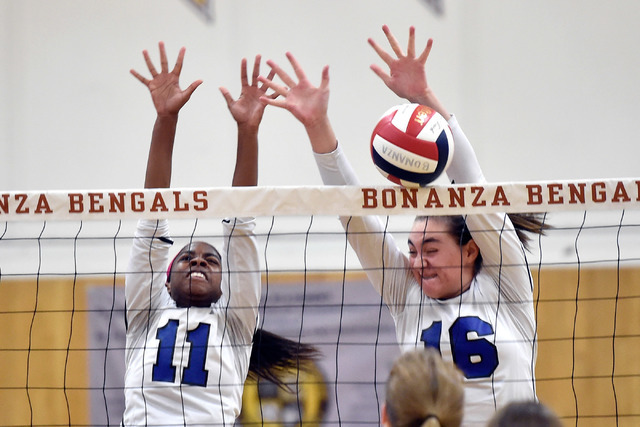 Sierra Vista’s Faith Gray-Williams (11) and and an unidentified player attempt to bloc ...