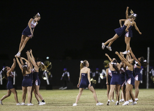 Liberty cheerleaders perform at halftime during a football game against Green Valley at Libe ...