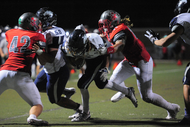 Shadow Ridge running back Elisha Young (2) is stopped short of the goal line during the Arbo ...