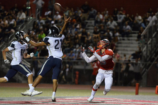 Shadow Ridge cornerback Kaelin Smith-Bejgrowicz (21) knocks a pass away during the Arbor Vie ...