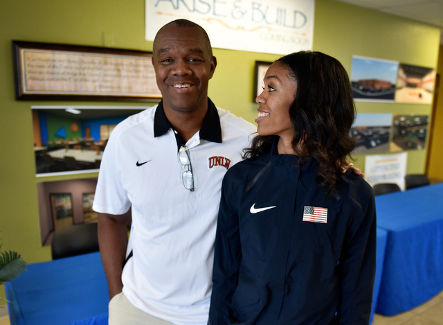 Bishop Gorman high jumper Vashti Cunningham, right, looks up to her father, former UNLV and ...