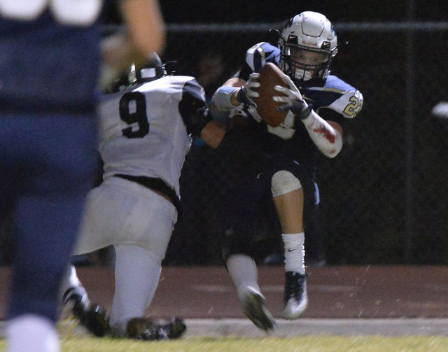 Foothill Falcons receiver Brandon Hargis (23) pulls down a pass to score a touchdown during ...