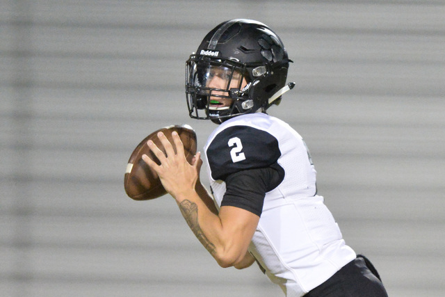 Palo Verde quarterback Jonathan Schofield (2) looks for an open receiver during the Legacy H ...