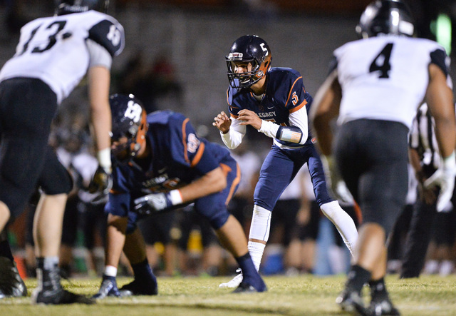 Legacy quarterback Roberto Valenzuela (5) gets ready to take a snap during the Legacy High S ...