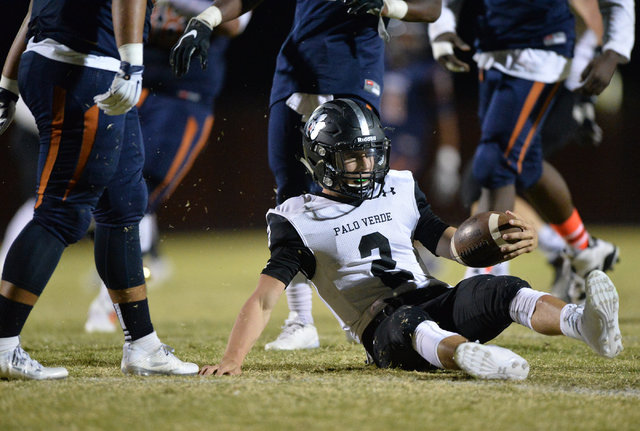 Palo Verde quarterback Jonathan Schofield (2) sits up after being sacked during the Legacy H ...