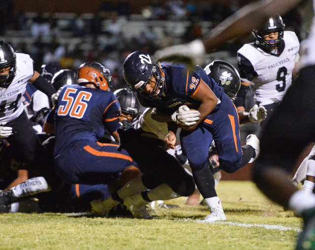 Legacy running back Sam Turner (22) scores a touchdown during the Legacy High School Palo Ve ...