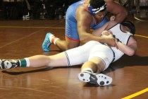 Bishop Gorman’s Jackson Perry, top, works against Shadow Ridge’s Jarrit Leonard ...