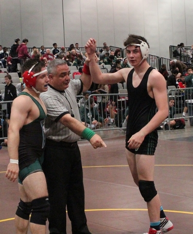 Palo Verde’s Josh Pine, getting his arm raised in victory at the Holiday Classic on Fr ...