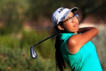 Mercedes Khumnark tees off during the Sunrise Region girls golf tournament at Anthem Country ...