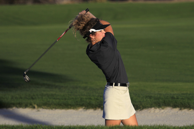 Desert Oasis’ Ashley Malone hits out of a bunker during the Sunset Region girls golf t ...
