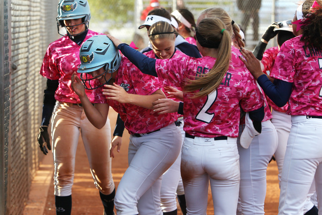Foothill hitter Daryan Meade is congratulated after her home run against Coronado during the ...