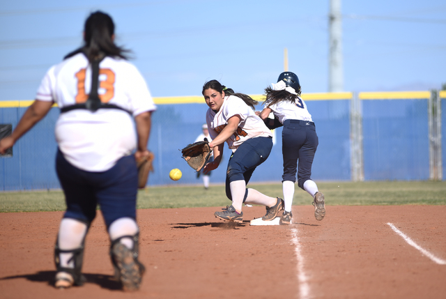 Legacy’s Alyssa Gastelum (14) attempts to catch the ball at first base against Shadow ...