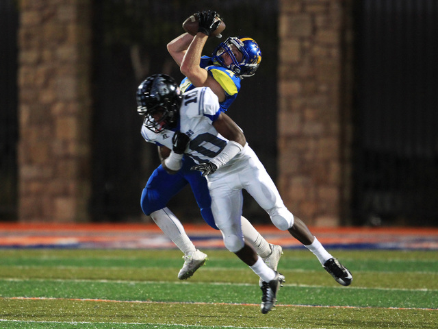 After beating Desert Pines safety Jon McCoy, Moapa Valley’s Kaleb Bodily pulls in a fo ...