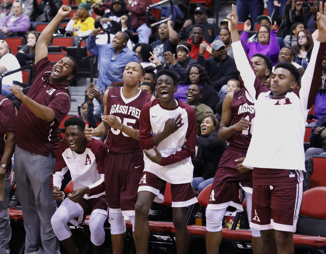 Agassi Prep’s players and coaches react during the second half of a Class 2A boys stat ...