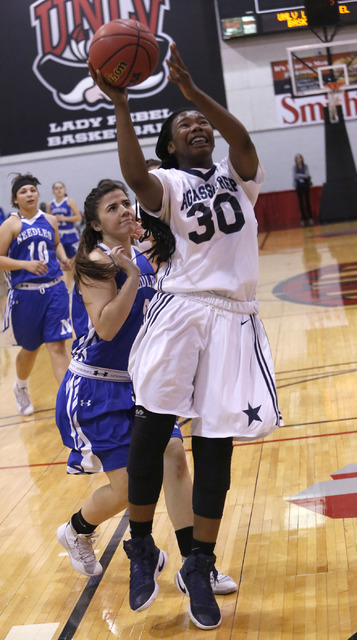 Agassi Prep’s Sharmayne Finley (30) shoots during the second half of a Class 2A girls ...