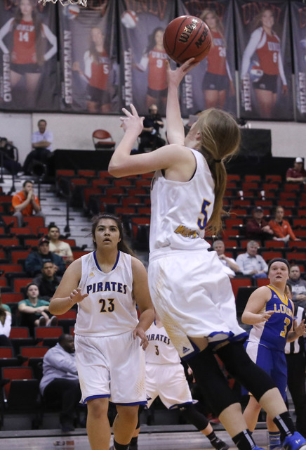 Moapa Valley’s Kinlee Marshall (5) shoots during the first half of a Class 3A girls st ...