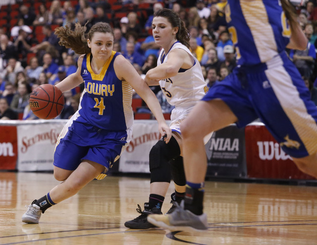 Lowry’s Sydney Connors (4) drives towards the hoop during the second half of a Class 3 ...