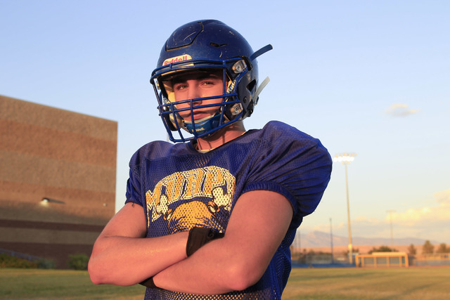 Moapa Valley High School center Cameron Larsen pauses for a photo during team practice at th ...
