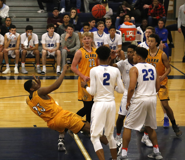 Clark’s Antwon Jackson (23) shots as he is falling during the first half of a Class 4A ...