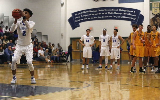 Bishop Gorman’s Jamal Bey (2) shoots a free throw after a technical foul was called d ...