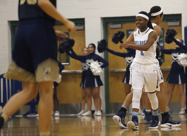 Centennial’s Pam Wilmore (1) laughs after scoring during the first half of a Class 4A ...