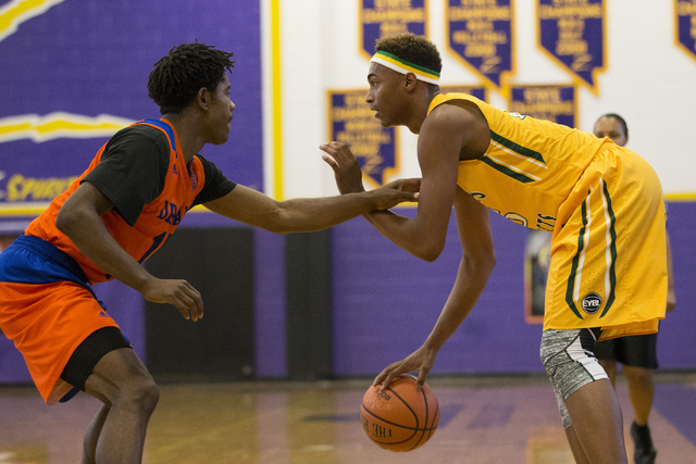 Las Vegas Prospects’ Charles O’Bannon Jr. (25) dribbles the ball against Dream V ...