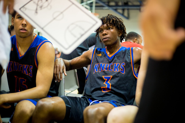 Las Vegas Knicks guard Isaiah Banks listens as plays are discussed during a game against the ...
