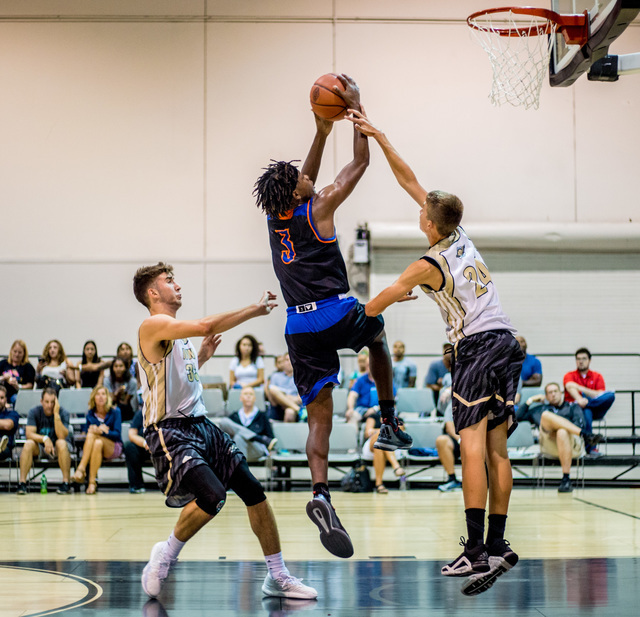 Las Vegas Knicks guard Isaiah Banks shoots the ball in a game against the Iowa Brainstorms i ...