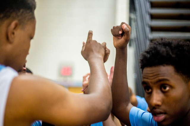 Team members of 702 Attack put their fists together before returning to the Fab 48 AAU tourn ...