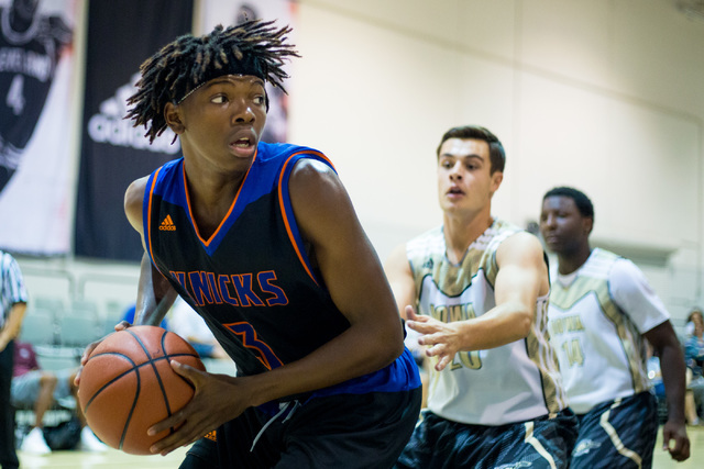 Las Vegas Knicks guard Isaiah Banks handles the ball in a game against the Iowa Brainstorms ...