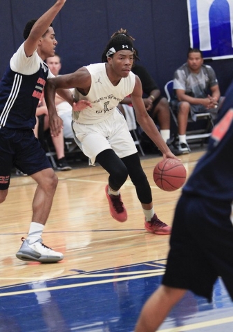 Greenwood Eliteճ Terry Armstrong (1) drives the ball for Costal Elite during the Las Vegas ...