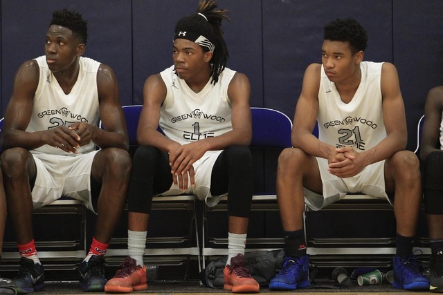 Greenwood Elite’s Terry Armstrong (1) is seen on the bench against Costal Elite during the ...