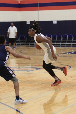 Greenwood Eliteճ Terry Armstrong (1) drives the ball against Costal Elite during the Las Ve ...
