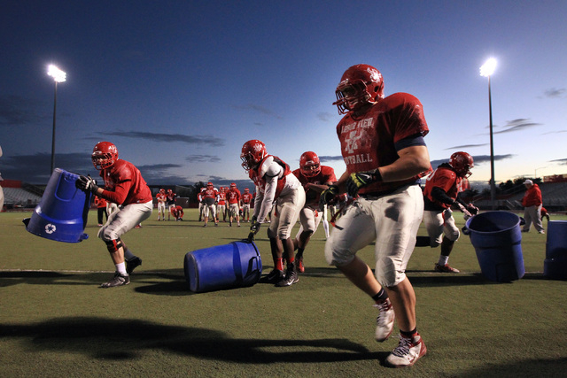 The Arbor View offensive line runs a drill during practice Wednesday, Nov. 19, 2014. Arbor V ...