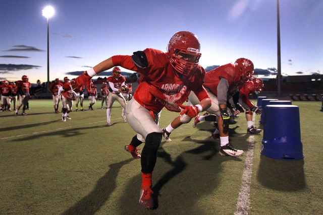 The Arbor View offensive line runs a drill during practice Wednesday, Nov. 19, 2014. Arbor V ...