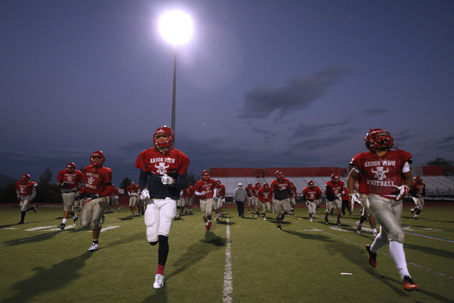 Arbor View players warm up during practice Wednesday, Nov. 19, 2014. Arbor View will face Bi ...