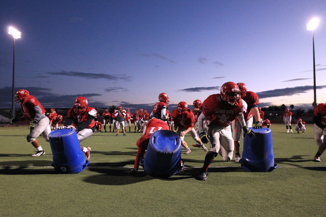 The Arbor View offensive line runs a drill during practice Wednesday, Nov. 19, 2014. Arbor V ...