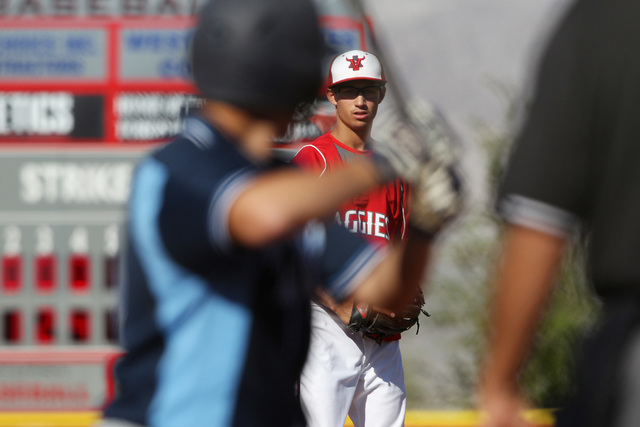 Arbor View pitcher Ben Cutting reads his catchers signals during their game against Sylmar M ...
