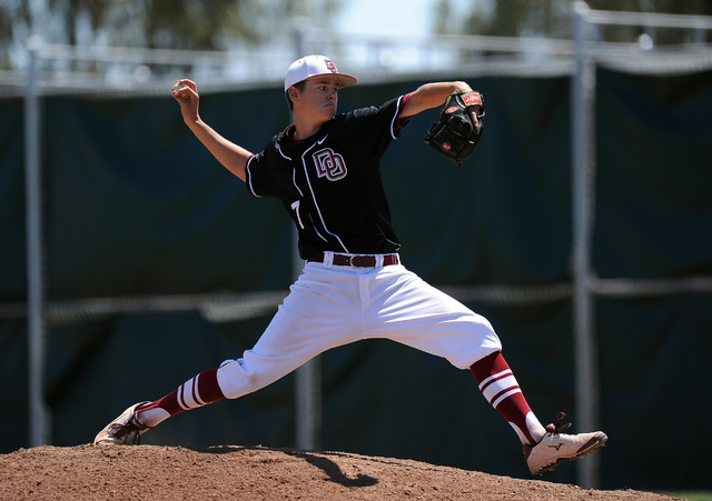 Desert Oasis starting pitcher Cade Adams delivers to Liberty in the sixth inning of their pr ...