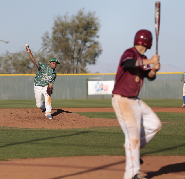 Green Valley junior Noah Wise (13) delivers a pitch to Desert Oasis senior Chase Adams (8) d ...