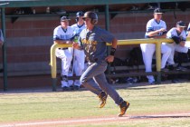Bonanza’s Micah Higa heads for home to score a run against Foothill during a baseball ...