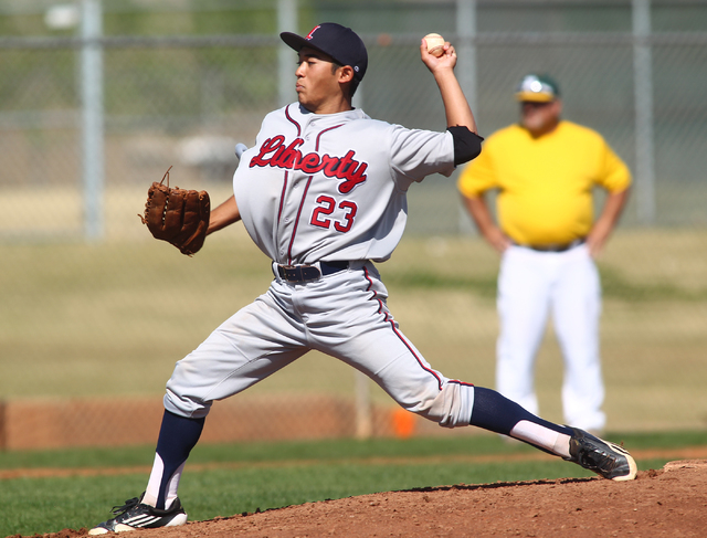 Liberty’s Jonathan Gilleres delivers a pitch in the Patriots’ game against Ranch ...